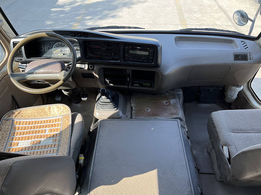 Autobus ISO Toyota Coaster de seconde main 20 places Autobus de tourisme d'occasion